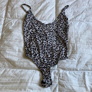 High cut low back cheetah print bodysuit size 0